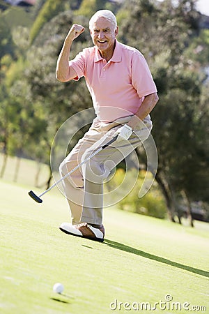 Man Playing A Game Of Golf Stock Photo