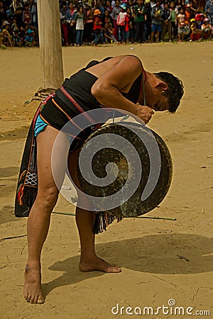 Man playing gong during Buffalo festival Editorial Stock Photo
