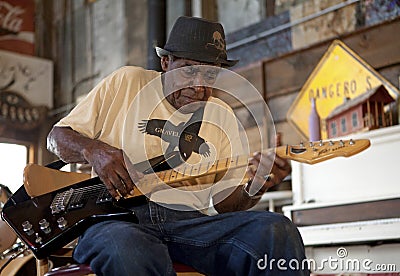 A man playing a guitar, Clarkesdale Editorial Stock Photo