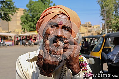 Man playing mouth harp at Mehrangarh Fort, Editorial Stock Photo