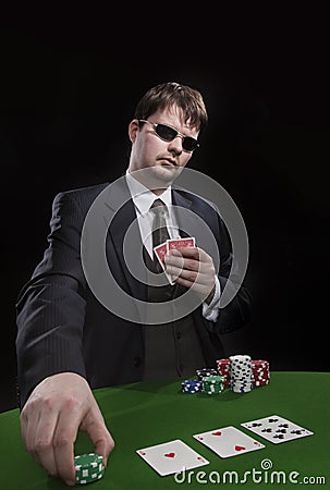 Man playing poker Stock Photo