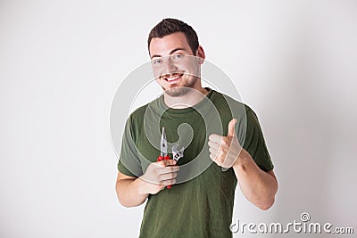 Man with pliers Stock Photo