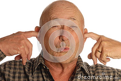 Man plugging ears Stock Photo