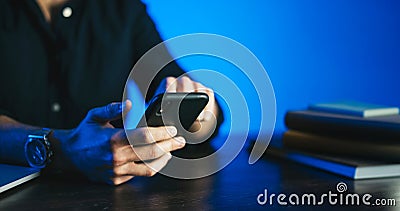 Man pointing on smartphone screen, chatting in social networks, meeting website, searching internet, sending sms, using text Stock Photo