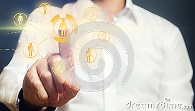 Man points a finger at a person on network pictogram. Choosing the best candidate for job specialist. Team leader, leadership Stock Photo