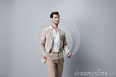 man portrait handsome happy smiling suit beige businessman business attractive copyspace Stock Photo