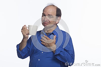 Man posing with coffee mug, horizontal Stock Photo