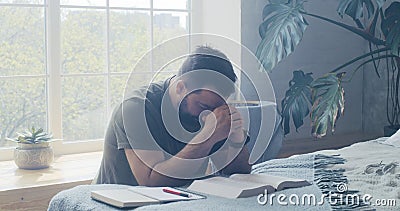 Man praying and murmuring Stock Photo