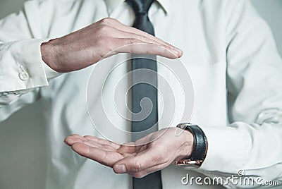 Man protecting hands. Stock Photo