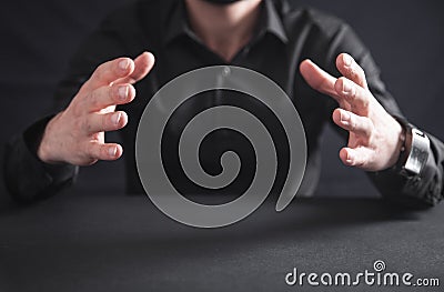 Man with protecting hands. Protecting gesture Stock Photo