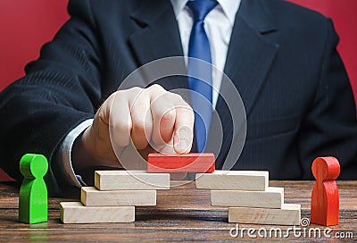 The man provides the conditions for negotiations and conflict resolution between opponents. Arbitrator mediator. Search for Stock Photo
