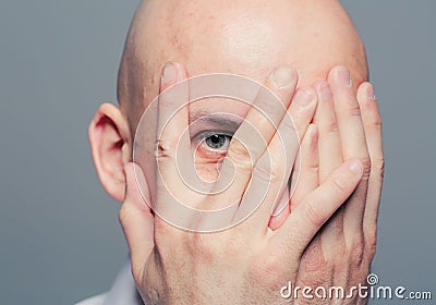 Man pry portrait hands close face Stock Photo