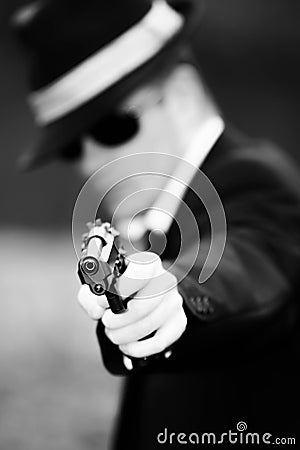 Man pulls a gun Stock Photo