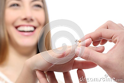 Man putting a engagement ring after proposal Stock Photo