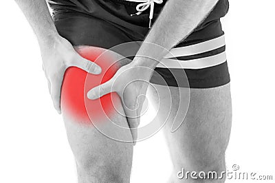 Man with quadriceps pain Stock Photo