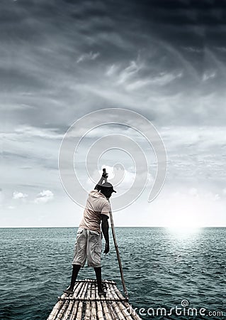 Man on raft Stock Photo