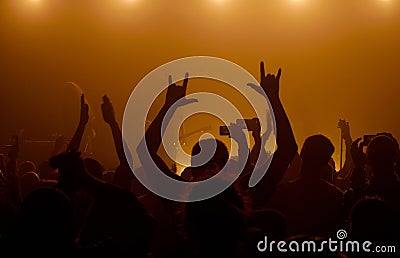 Man raising up hands at rock concert Editorial Stock Photo