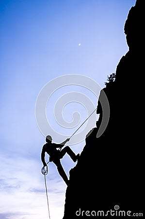 Man rappeling Stock Photo