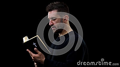 Man reading bible, spiritual support, religious belief, peace in soul, worship Stock Photo