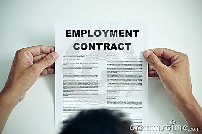 Man reading an employment contract Stock Photo