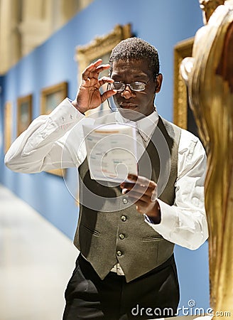 Man reading guidebook Stock Photo