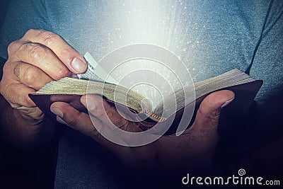 Man reading the Holy Bible Stock Photo