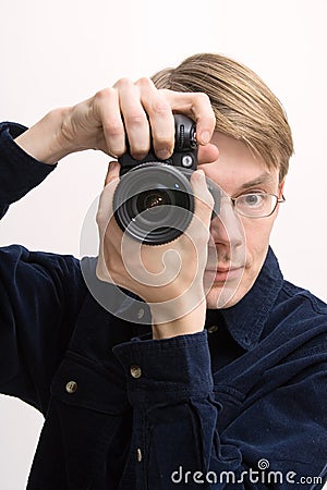 Man with reflex camera Stock Photo