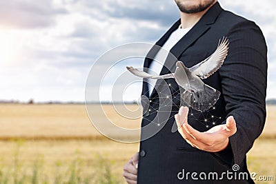 A man releases a dove Stock Photo