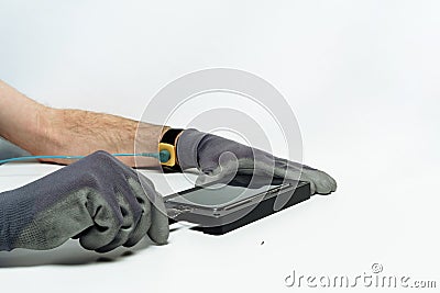 Man repair mobile phone broken display screwdriver Stock Photo