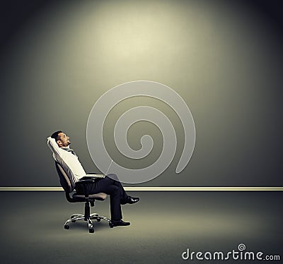 Man resting on the chair Stock Photo