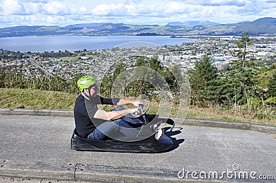Man ride on Skyline Rotorua Luge Editorial Stock Photo