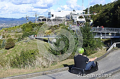 Man ride on Skyline Rotorua Luge Editorial Stock Photo