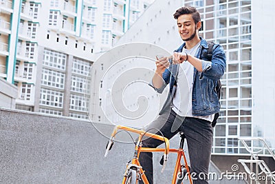 Man riding a bicycle outside Stock Photo