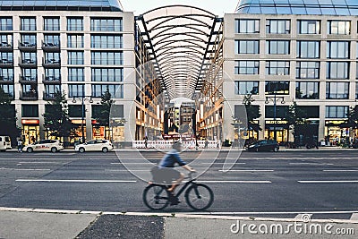 Man Riding Bike on Berlin Street by Evening Editorial Stock Photo