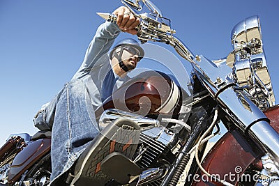 Man Riding Motorcycle Stock Photo