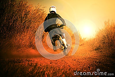 man riding motorcycle in motorcross track use for people activities and leisure ,traveling Stock Photo