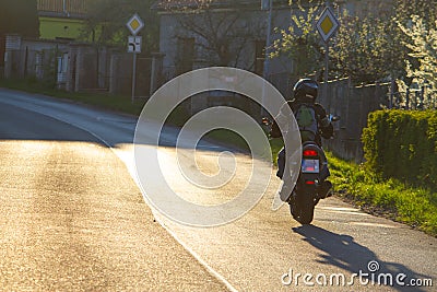 Man riding a motorcycle on the way Stock Photo