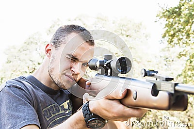 Man with Rifle Stock Photo