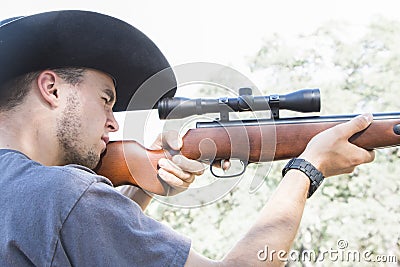 Man with Rifle Stock Photo