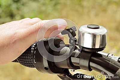 Man ringing a bicycle bell Stock Photo