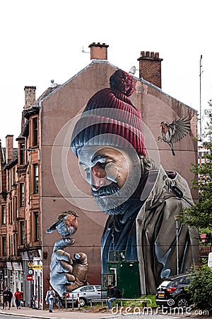 Man with a Robin On His Finger Mural High Street Glasgow. Modern Day Mungo Editorial Stock Photo