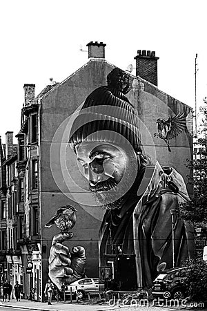 Man with a Robin On His Finger Mural High Street Glasgow. Modern Day Mungo Editorial Stock Photo