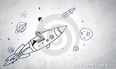 Man on rocket Stock Photo