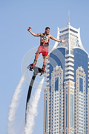 Man rocketing from the water on a flyboard Editorial Stock Photo