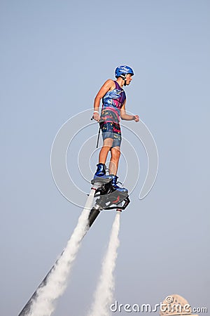 Man rocketing from the water on a flyboard Editorial Stock Photo