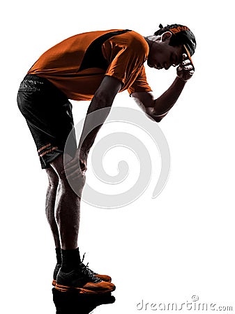 Man runner jogger tired exhaustion breathless heat silhouette Stock Photo