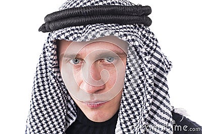 Man's face covered with Arab scarf Stock Photo