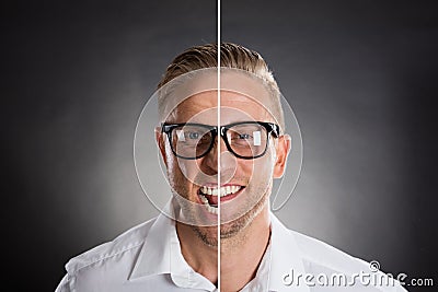 Man`s Face Showing Anger And Happy Emotions Stock Photo