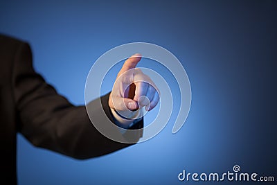 Man's finger pressing invisible button Stock Photo