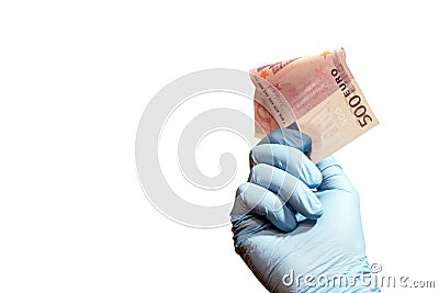 A man`s hand in a blue glove holds five hundred euros. The concept of paid medicine, payment for laboratory work, corruption in s Stock Photo